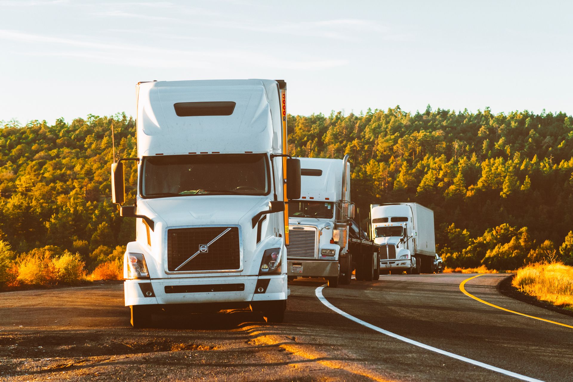 Semi trucks pulled over on an uphill grade